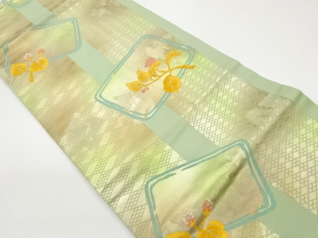 Nagoya obi with woven striped pattern of flowers, leaves, fruit, and dashes on c